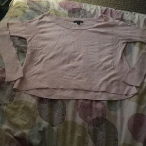 This is a light pink American Eagle shirt